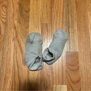 Used gray women’s socks with pink stripe